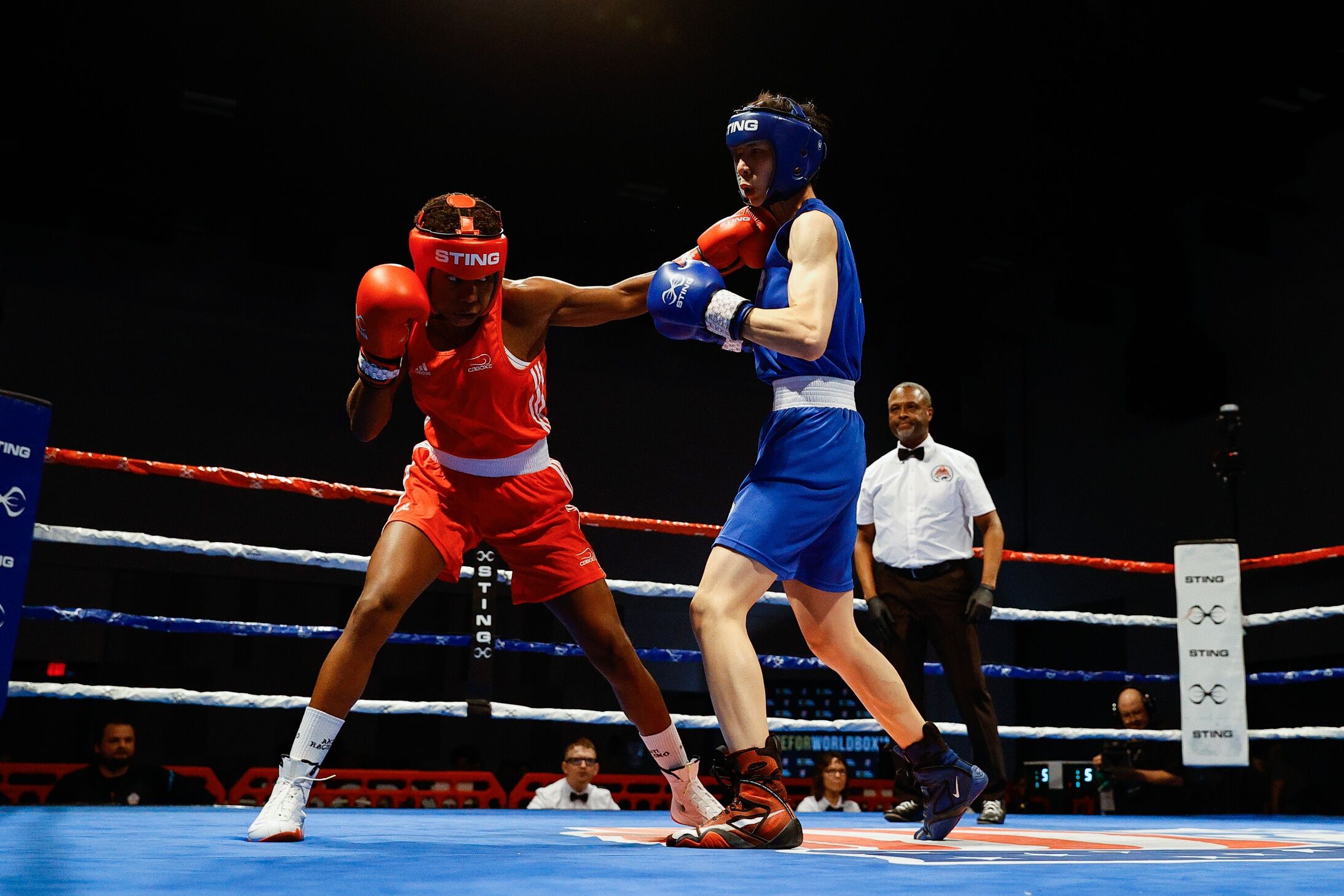 April 16, 2024; Pueblo, Colorado: Jucielen Romeu (Brazil) in red and Yu-Ting Lin (Taiwan) in blue compete in the elite female 57kg