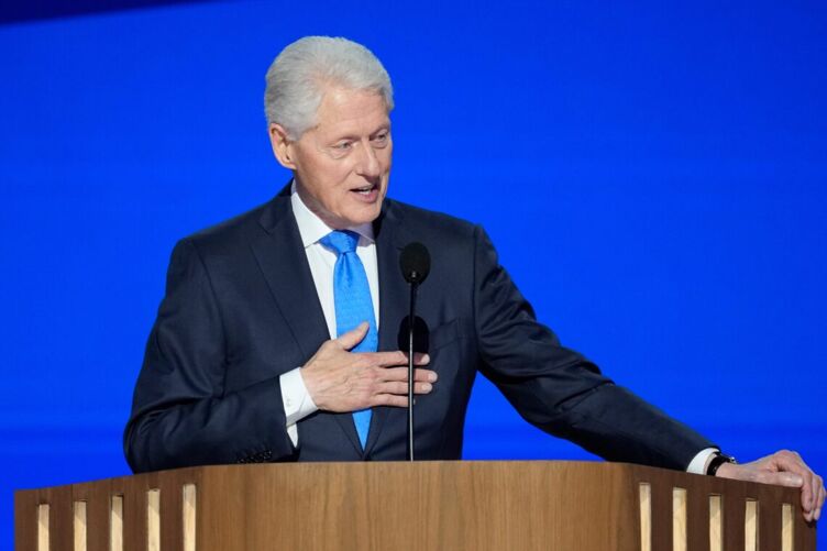 Former President Bill Clinton speaks during the third day of the Democratic National Convention at the United Center.