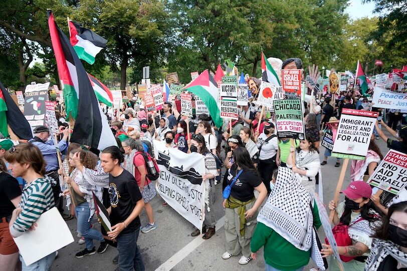 Aug 19, 2024; Chicago, IL, USA; Pro-Palestinian protesters march from Union Park during the first day of the Democratic National Convention in Chicago. Mandatory Credit: Mike De Sisti-USA TODAY