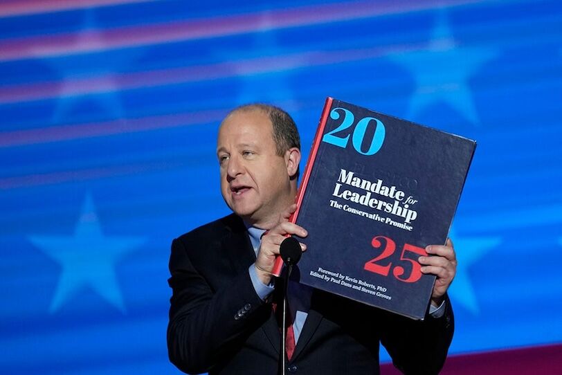 Colorado Gov. Jared Polis speaks during the third day of the Democratic National Convention at the United Center.