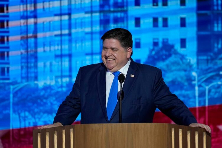 Aug 20, 2024; Chicago, IL, USA; Illinois Gov. J.B. Pritzker speaks during the second day of the Democratic National Convention at the United Center. Mandatory Credit: Jasper Colt-USA TODAY