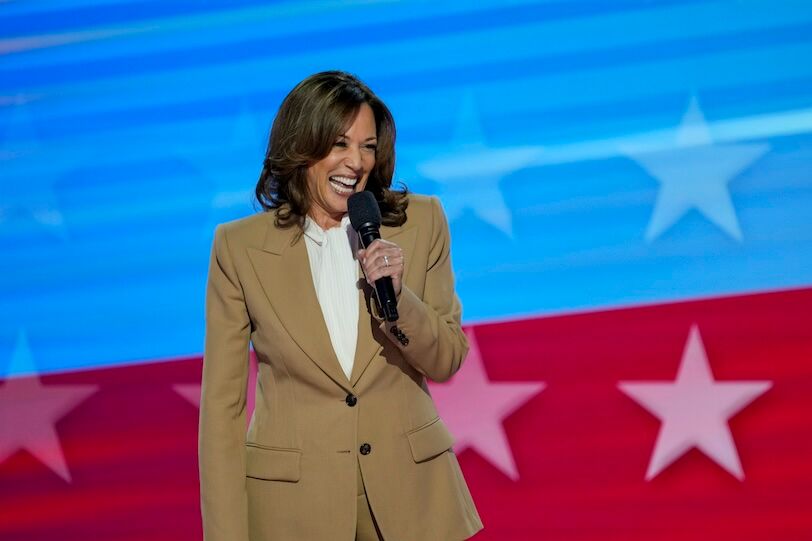 Aug 19, 2024; Chicago, IL, USA; Vice President Kamala Harris takes the stage during the first day of the Democratic National Convention at the United Center. The DNC program will feature President Joe Biden and Former Secretary of State Hillary Clinton during Monday's ceremonies. Mandatory Credit: Jasper Colt-USA TODAY