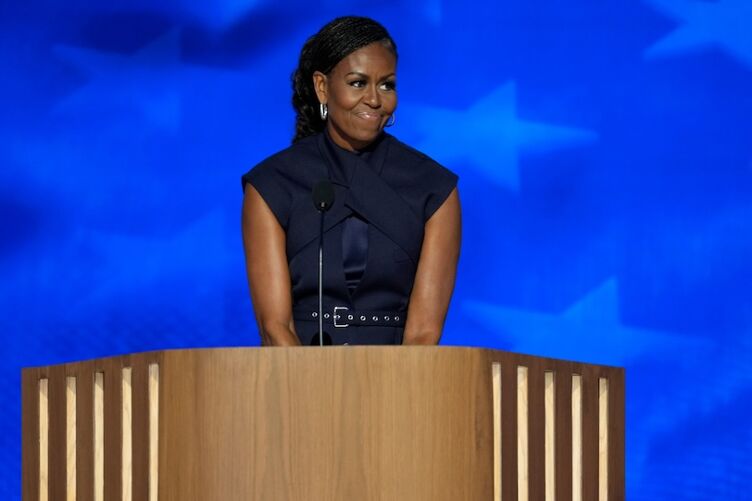 Former first lady Michelle Obama speaks during the second day of the Democratic National Convention at the United Center.