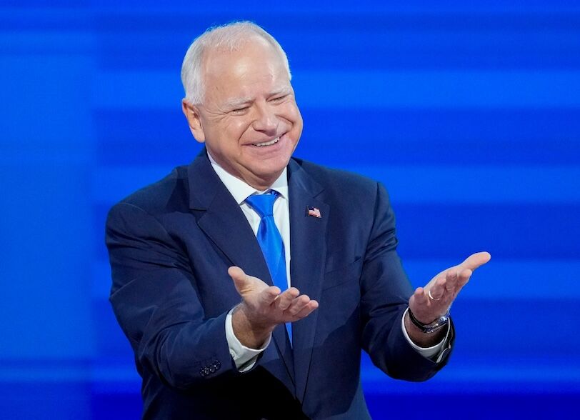 dnc-2024-tim-walz Democratic Vice Presidential nominee Tim Walz takes the stage to give an acceptance speech during the third day of the Democratic National Convention at the United Center.