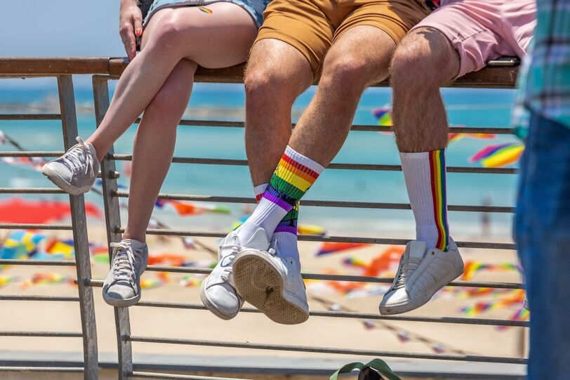 Rainbow colored socks at 21th annual Tel Aviv Pride Week. At the parade, people walking, dancing, singing, waving banners and rainbow flags celebrating the largest LGBT event in the middle east.