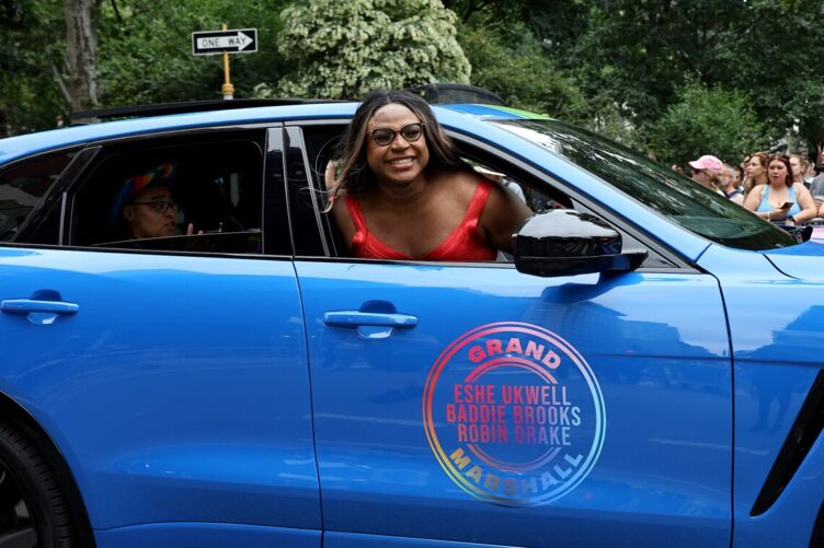 Grand marshal Baddie Brooks rides in a Jaguar F-PACE at the 2024 NYC Pride March on June 30, 2024, in New York City.