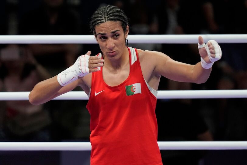 Aug 3, 2024; Paris, France; Imane Khelif (ALG) reacts after defeating Anna Luca Hamori (HUN) in a women's 66kg boxing quarterfinal during the Paris 2024 Olympic Summer Games at North Paris Arena. Mandatory Credit: Katie Goodale-USA TODAY Sports