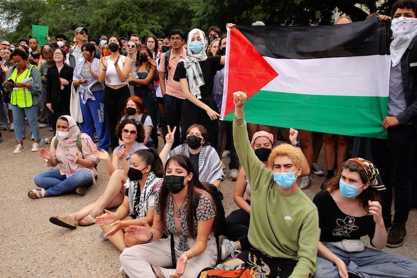 Austin, TX, USA - April 25, 2024: University of Texas students protest Israel's war in Gaza and the arrest of students at a demonstration the previous day at a rally on campus.