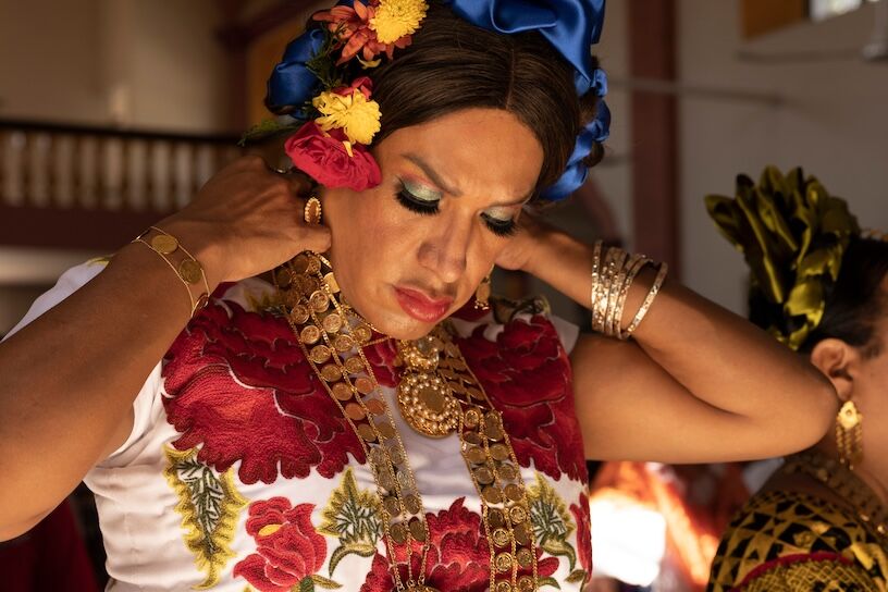 Portrait of a Muxe, man who dresses like a woman in Mexico, in the church.