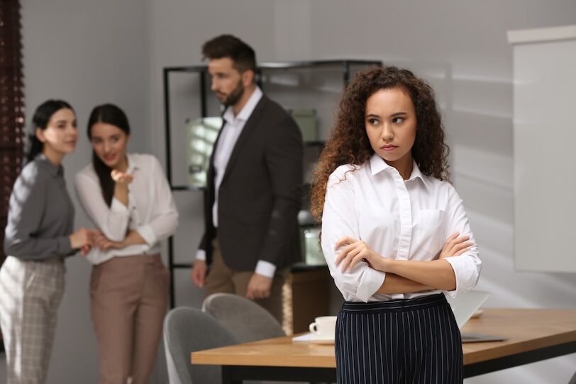 African American woman suffering from racial discrimination at work