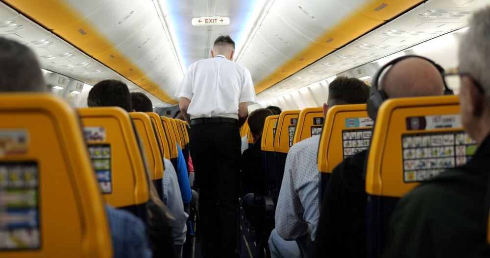 A flight attendant in a plane