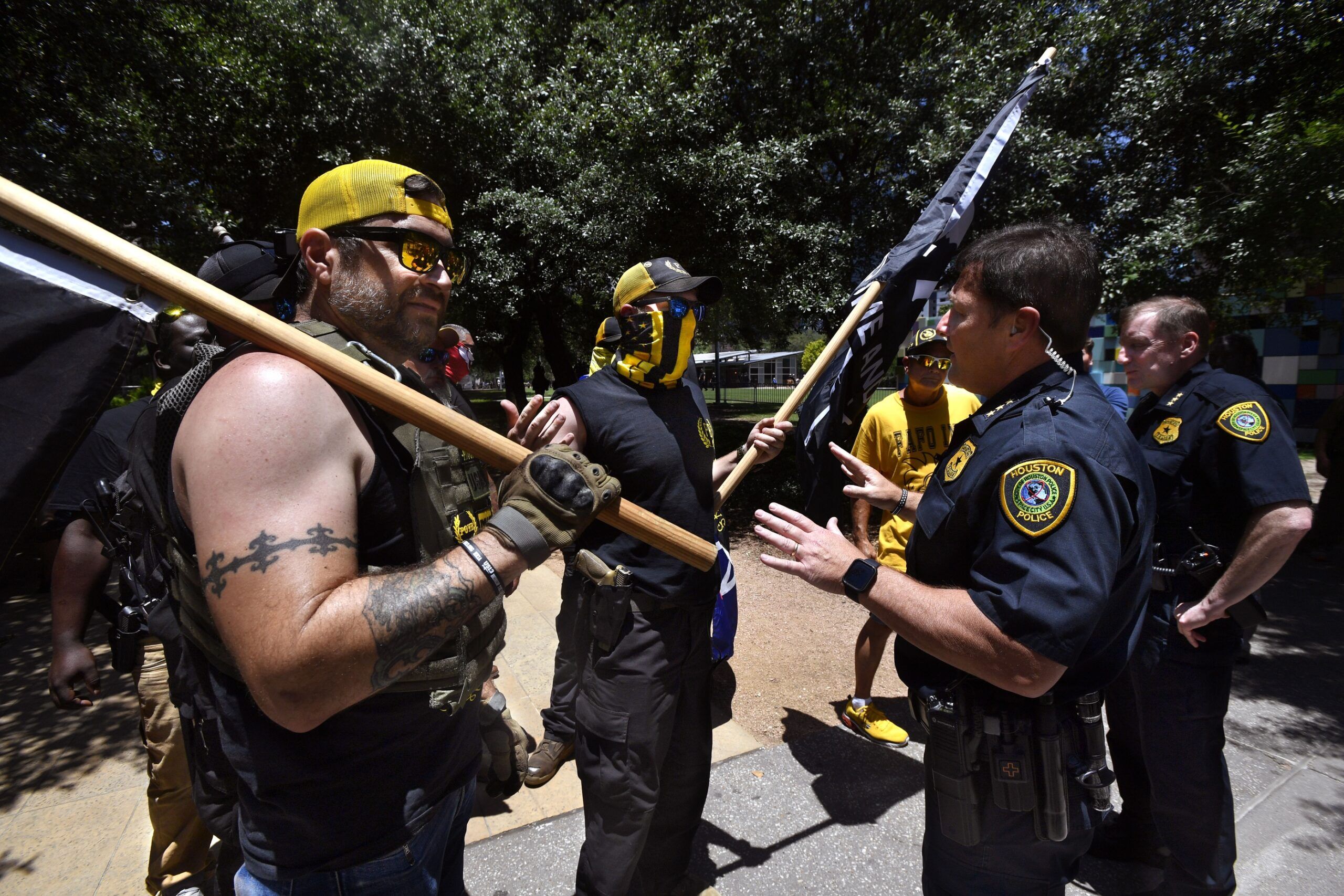 May 28, 2022; South Texas Proud Boys members are confronted by Houston police