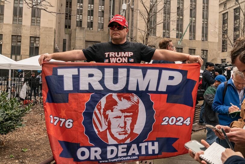 Pro-Trump supporters rally at New York criminal court on April 4, 2023 during appearance by Former President Donald Trump Jr.