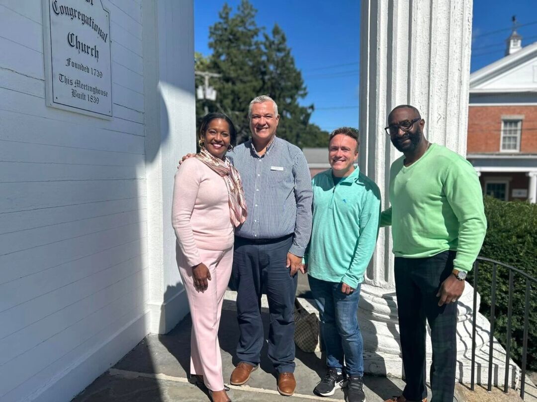 Democratic U.S. Senate candidate Jahana Hayes (left) stands next to Christopher Cole and their respective spouses at a church last Sunday morning.