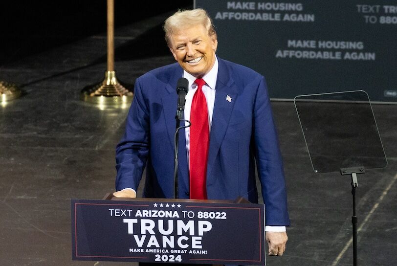 donald-trump-transphobia Former president Donald J. Trump smiles while delivering remarks on Sept. 12, 2024, at Tucson Music Hall in Tucson, Ariz.