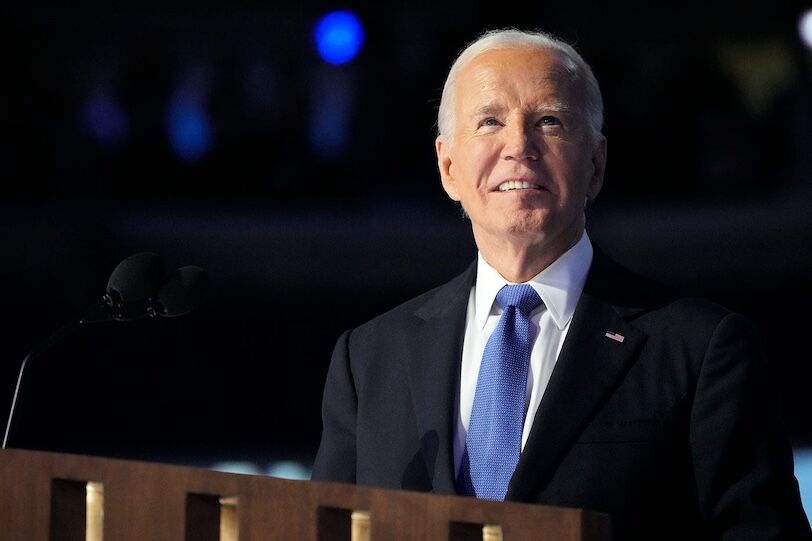 President Joe Biden speaks during the first day of the Democratic National Convention at the United Center.