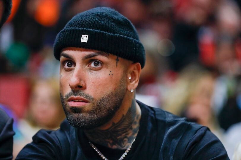 Feb 15, 2022; Miami, Florida, USA; American singer Nicky Jam attends the game between the Dallas Mavericks and the Miami Heat at FTX Arena. Mandatory Credit: Sam Navarro-USA TODAY Sports