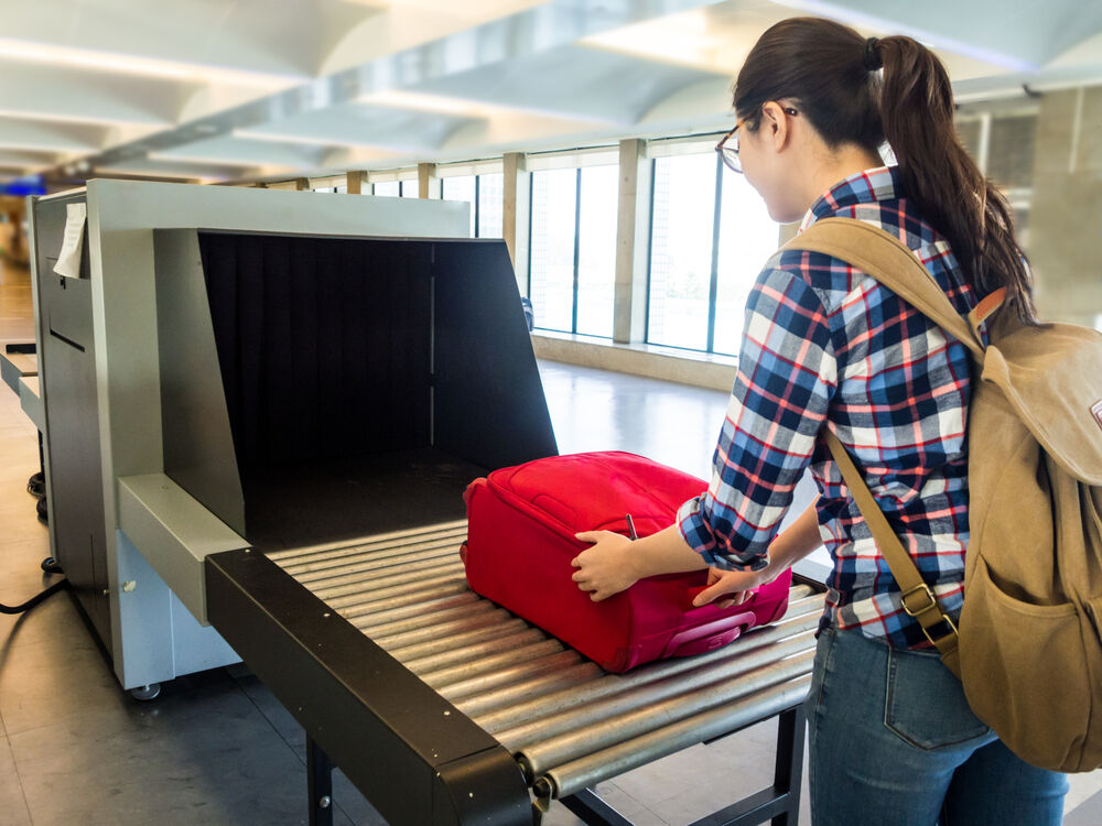 A teen girl at airport security