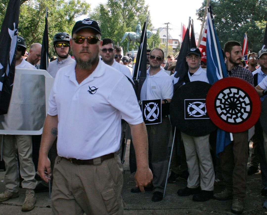 Aug 12, 2017; Charlottesville, VA, USA; James Fields, Jr. (fourth from right) is seen at the Unite the Right rally. James Fields Jr., 20, is being held on suspicion of second-degree murder, malicious wounding and failure to stop in an accident that resulted in death. Mandatory Credit: Alan Goffinski-USA TODAY NETWORK