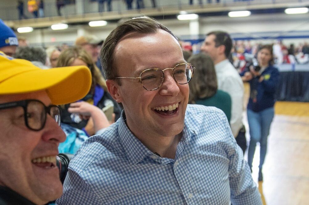 Chasten Buttigieg with a supporter in advance of South Carolina's primary, Friday, February 28, 2020