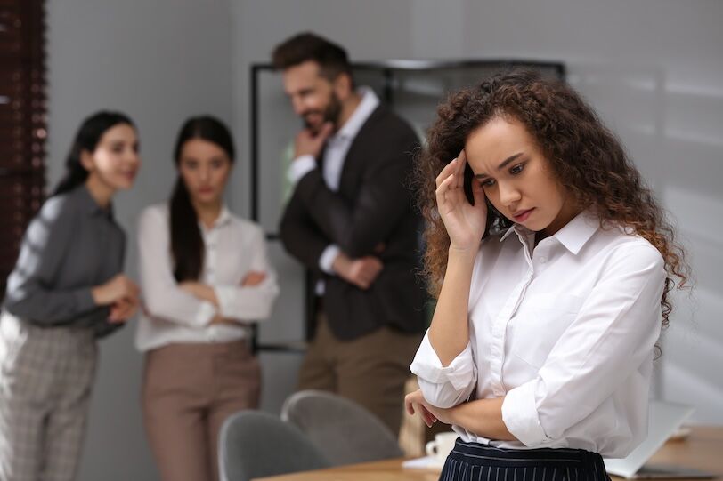 African American woman suffering from racial discrimination at work