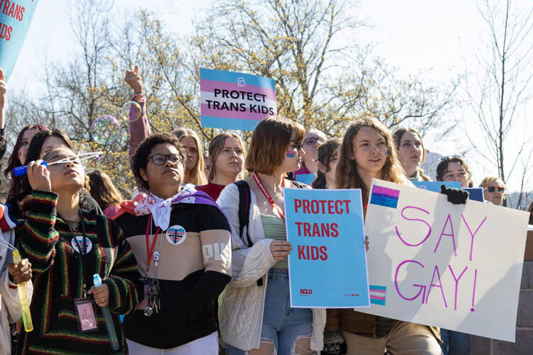 Teens from various areas of Kentucky gather in front of the Kentucky Capitol Annex building on March 29, 2023, to protest against SB150 which would ban gender-affirming health care for transgender teens.