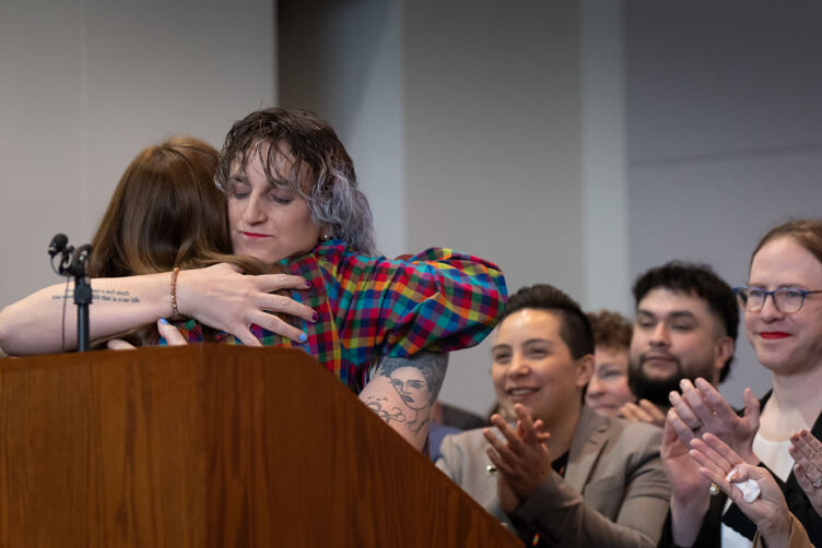 MN: Rep. Leigh Finke, DFL-St. Paul, author of the trans refugee bill hugs Lt. Gov. Peggy Flanagan.