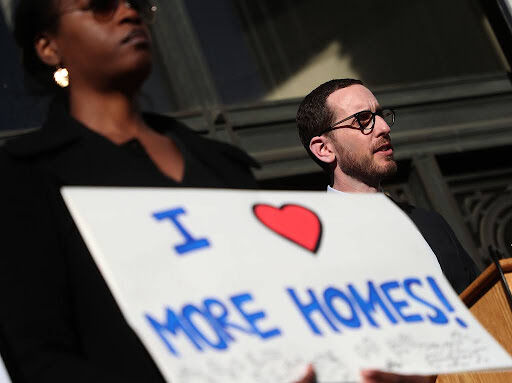 OAKLAND, CA - JANUARY 7: Senator Scott Wiener, right, speaks during a press conference announcing revisions to Senate Bill 50 the "More HOMES Act" on Tuesday, Jan. 7, 2020 in Oakland, Calif.