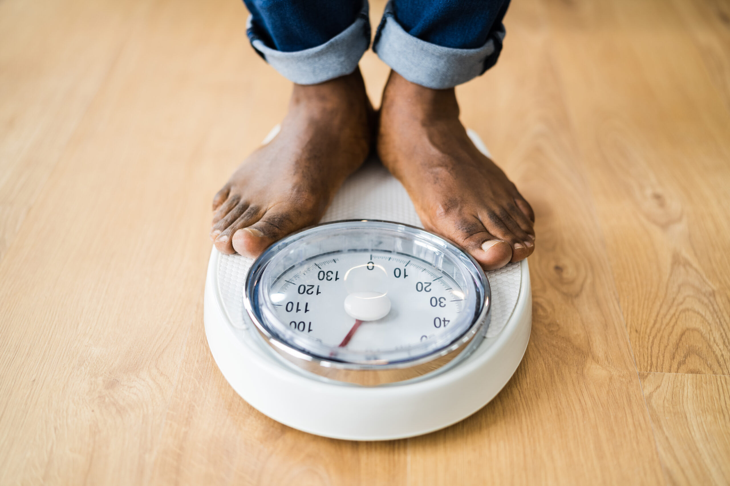 Feet Standing On Weight Scale