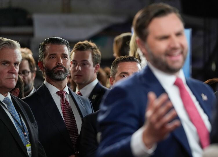 Oct 1, 2024; New York, NY, USA; Donald Trump Jr. listens as Republican JD Vance speaks to Sean Hannity in The Spin Room after the vice presidential debate with Democrat Tim Walz moderated by CBS Evening News anchor and managing editor Norah O’Donnell and Face the Nation moderator and chief foreign affairs correspondent Margaret Brennan