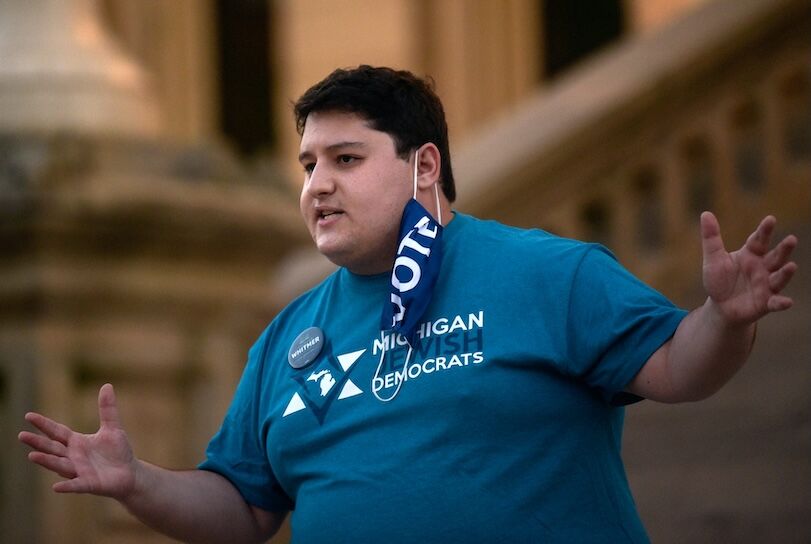 Noah Arbit, is the gay founder and chair of the Michigan Democratic Jewish Caucus. Here, he speaks during a rally in support of Gov. Whitmer on Thursday, Oct. 8, 2020, at the Capitol in Lansing.