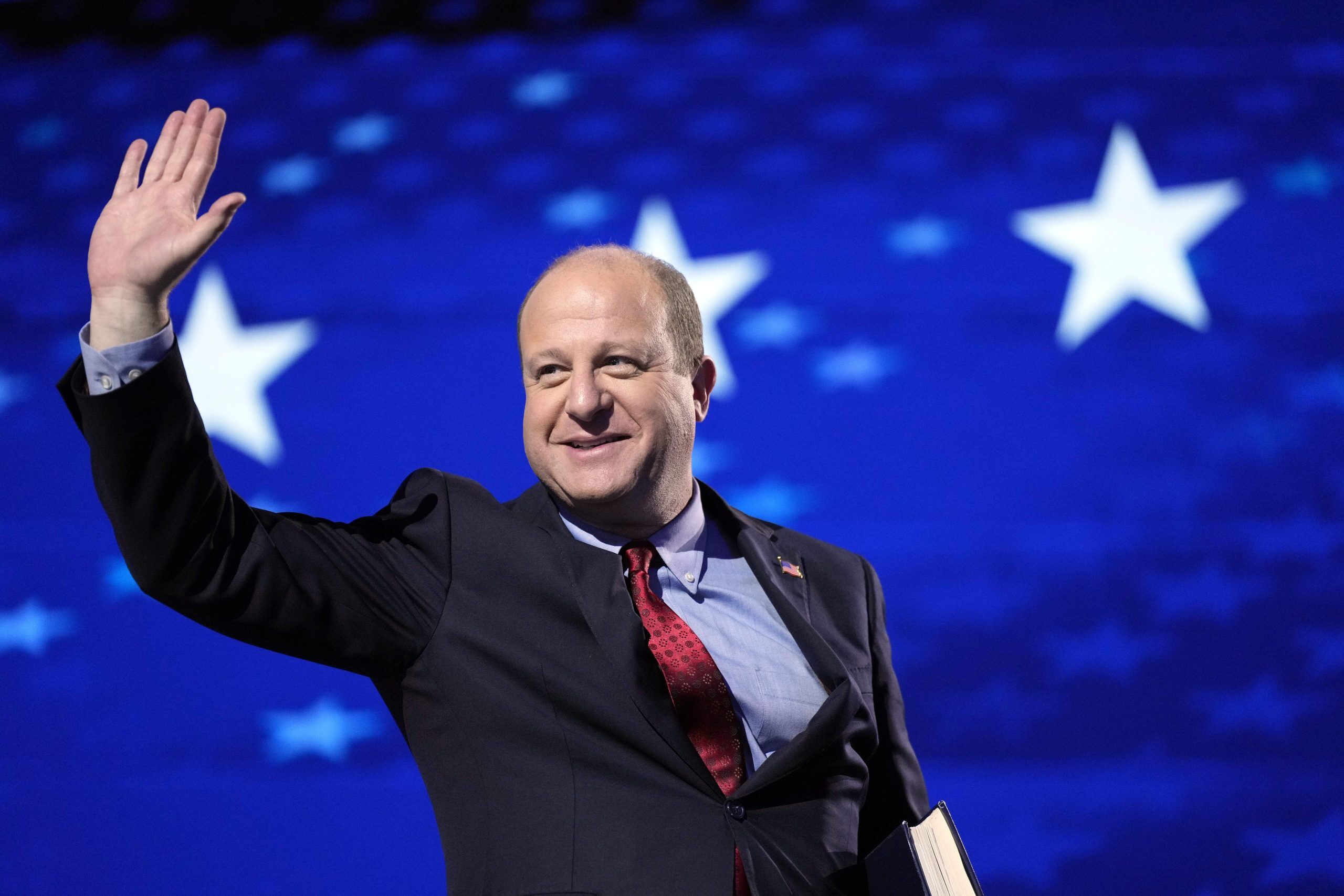 © Mike De Sisti-USA TODAY Aug 21, 2024; Chicago, IL, USA; Colorado Gov. Jared Polis speaks during the third day of the Democratic National Convention at the United Center. Mandatory Credit: Mike De Sisti-USA TODAY