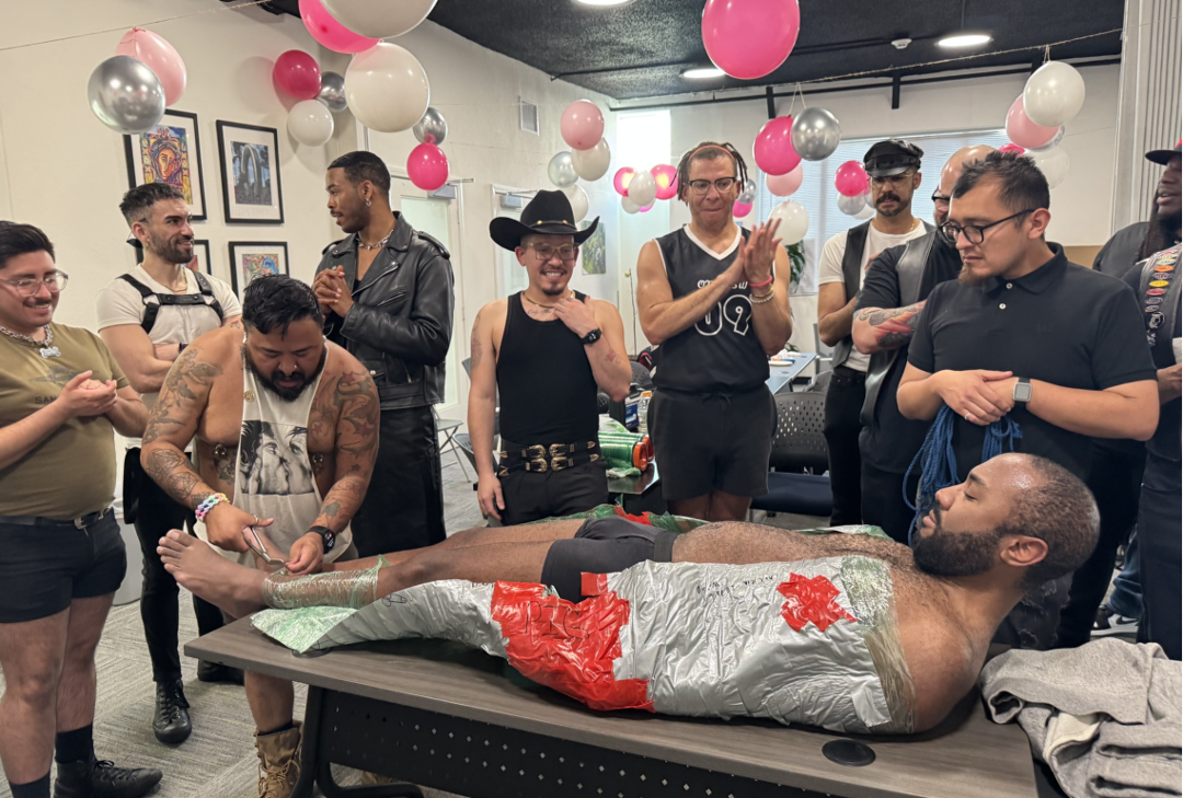 The men of Onyx Southwest hold a mummification demonstration.
