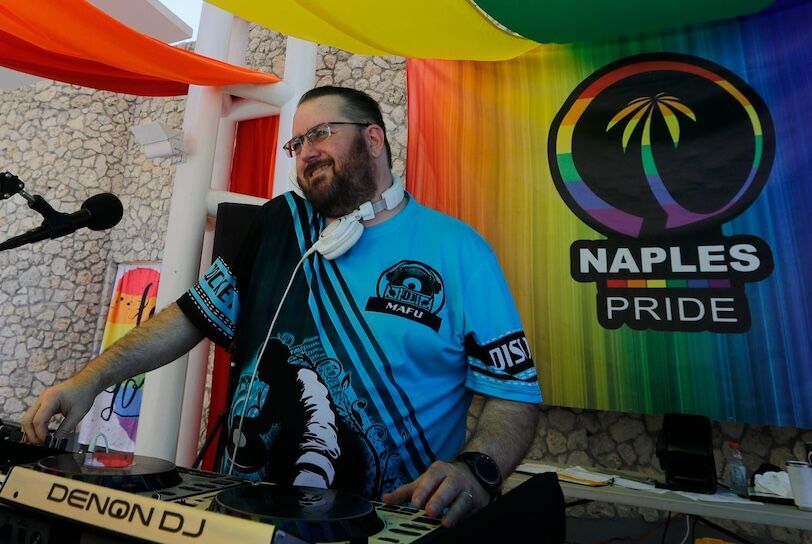 USATSI_20866193 DJ Mafumix, aka Matthew Sweeney, plays for the crowd during the 5th Annual Naples Pride Fest. The event held at Cambier Park in Downtown Naples on Saturday, June 10, 2023. It celebrated the LGBTQ community and provided music, entertainment, food and vendor merchandise for the attending public.