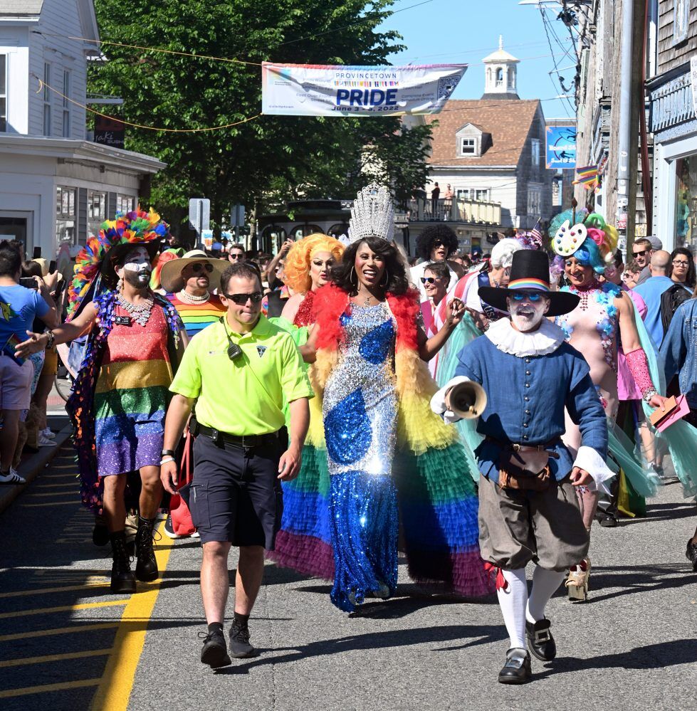 PROVINCETOWN 06/04/22 Participants walk down Commercial street to the Boat House for the Provincetown Pride rally Saturday evening.
Ron Schloerb/Cape Cod Times