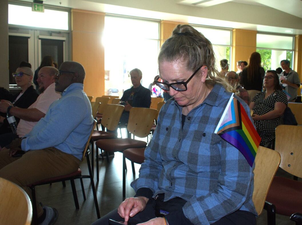 Mieke Miller of Thousand Oaks shows her support for the LGBTQ+ community at a town hall event on June 5, 2025, in Thousand Oaks.