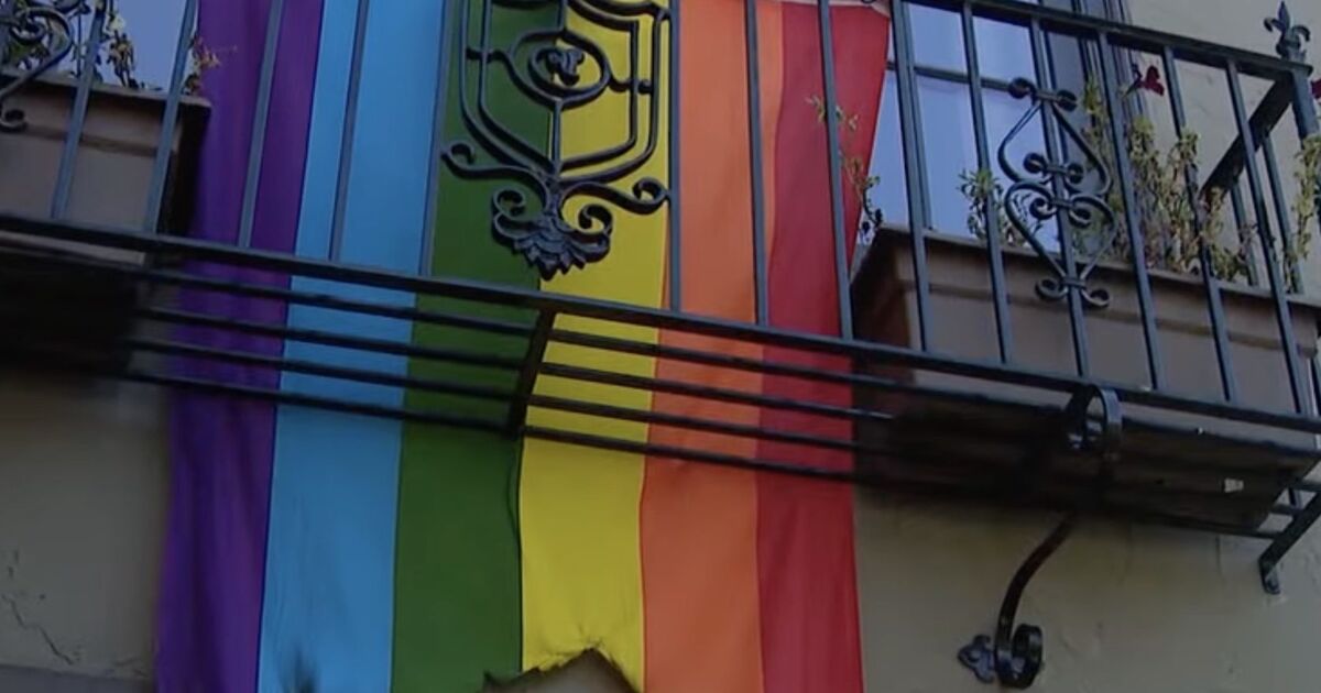 An arsonist set fire to a gay couple's Pride flag while they were home. They want justice. - LGBTQ Nation