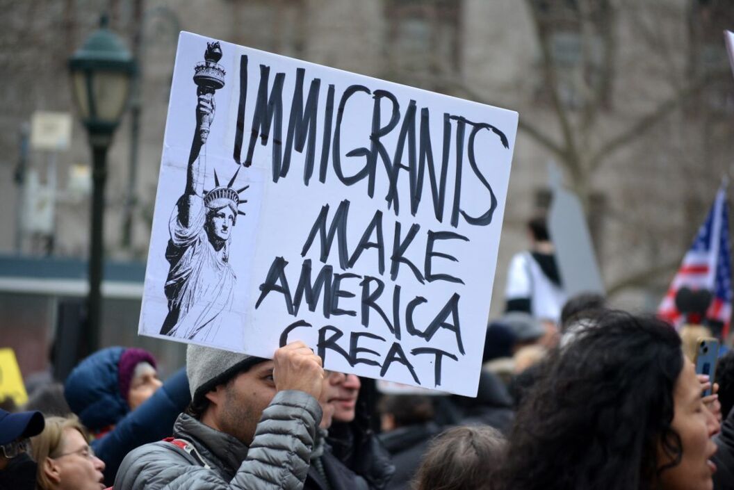 NEW YORK, NEW YORK USA - March 15, 2025: Pro-Immigration sign at a Stop the Cuts rally against DOGE cuts to federal funding in Lower Manhattan. 