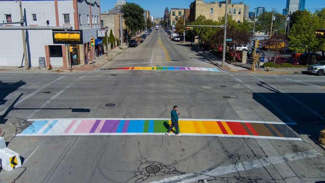 Crosswalks in the Walker's Point neighborhood are now painted rainbow at the intersection of Second Street and National Avenue in Milwaukee, Wisconsin on Oct. 8, 2025. The new street art, designed by street artist Jeremy Novy, was led by the Wisconsin LGBTQ History Project as a way to show the neighborhood's pride and inclusiveness.