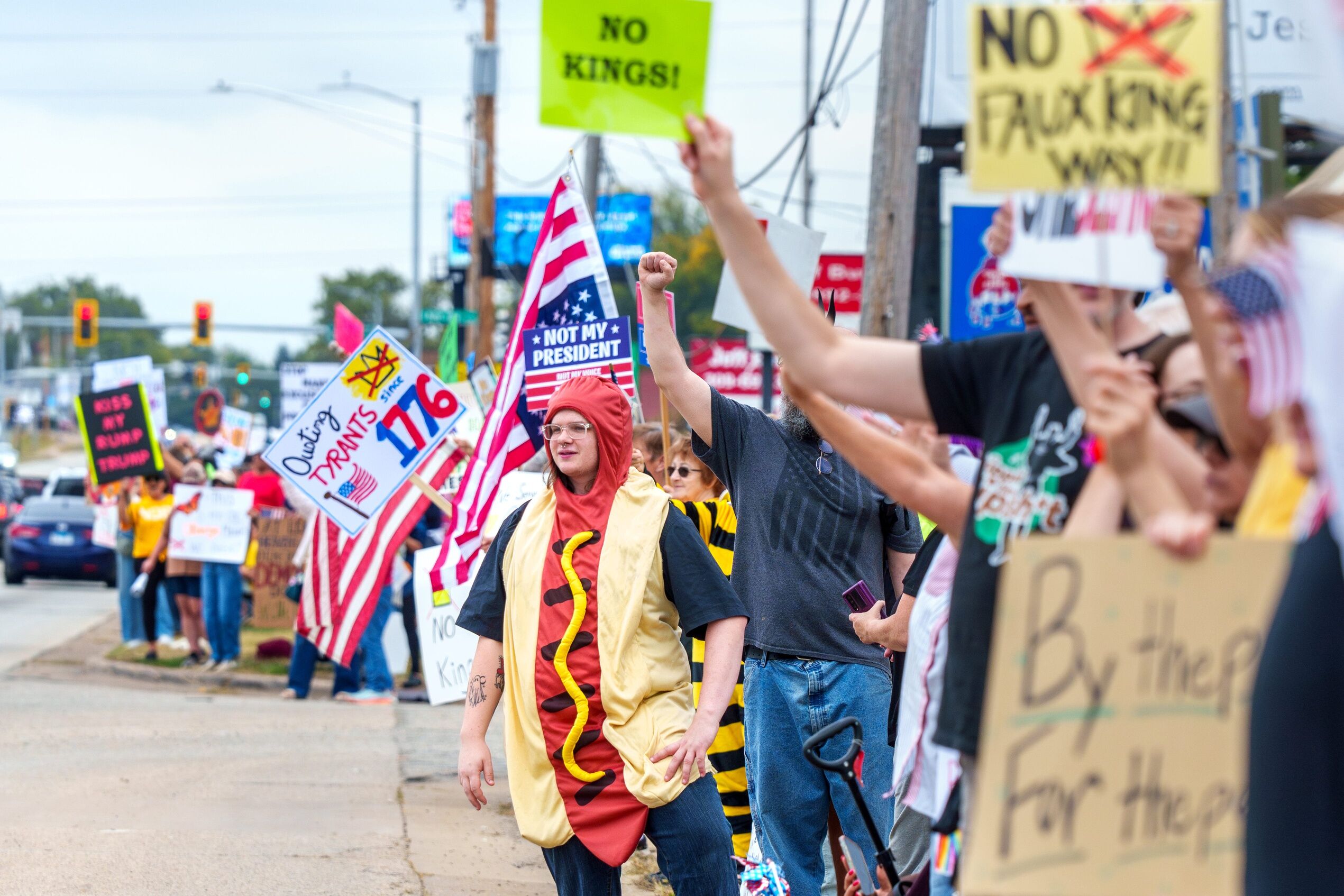 61-year-old woman arrested at No Kings protest for "obscene" costume in viral video - LGBTQ Nation