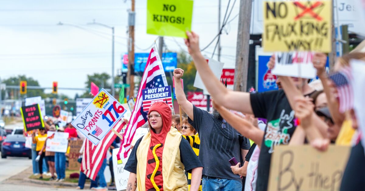 61-year-old woman arrested at No Kings protest for "obscene" costume in viral video - LGBTQ Nation
