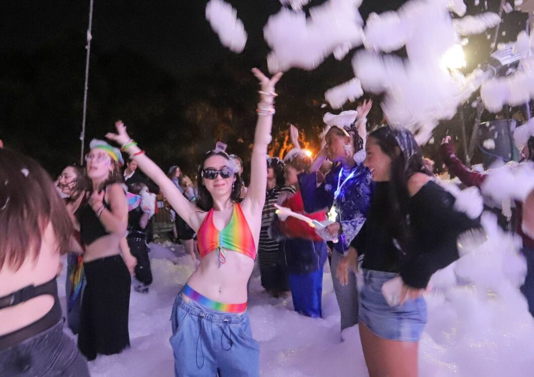 Dancers move around in foam during the Savannah Pride Festival on Saturday, October 25, 2025 at Forsyth Park.